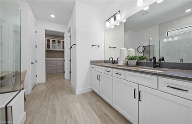 This stunning Mystique Home which is currently under on Valencia Golf and Country Club in Florida - for sale on GolfHomes.com, golf home, golf lot