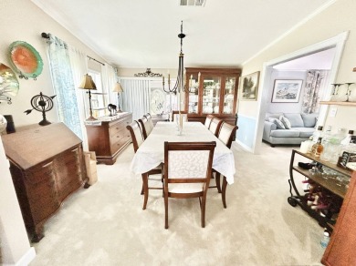 This lovely 3-bedroom, 2-bathroom manufactured home is located on Crane Lakes Golf and Country Club in Florida - for sale on GolfHomes.com, golf home, golf lot