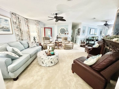 This lovely 3-bedroom, 2-bathroom manufactured home is located on Crane Lakes Golf and Country Club in Florida - for sale on GolfHomes.com, golf home, golf lot