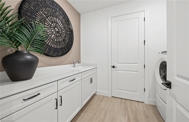 This stunning Mystique Home which is currently under on Valencia Golf and Country Club in Florida - for sale on GolfHomes.com, golf home, golf lot