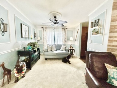 This lovely 3-bedroom, 2-bathroom manufactured home is located on Crane Lakes Golf and Country Club in Florida - for sale on GolfHomes.com, golf home, golf lot
