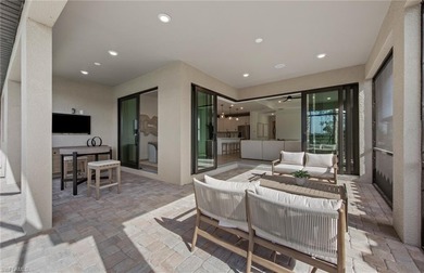 This stunning Mystique Home which is currently under on Valencia Golf and Country Club in Florida - for sale on GolfHomes.com, golf home, golf lot