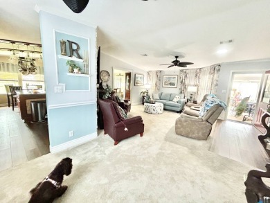 This lovely 3-bedroom, 2-bathroom manufactured home is located on Crane Lakes Golf and Country Club in Florida - for sale on GolfHomes.com, golf home, golf lot