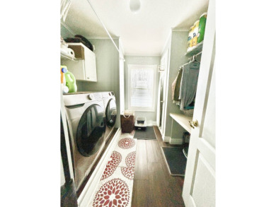This lovely 3-bedroom, 2-bathroom manufactured home is located on Crane Lakes Golf and Country Club in Florida - for sale on GolfHomes.com, golf home, golf lot