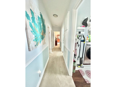 This lovely 3-bedroom, 2-bathroom manufactured home is located on Crane Lakes Golf and Country Club in Florida - for sale on GolfHomes.com, golf home, golf lot