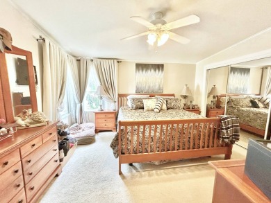 This lovely 3-bedroom, 2-bathroom manufactured home is located on Crane Lakes Golf and Country Club in Florida - for sale on GolfHomes.com, golf home, golf lot
