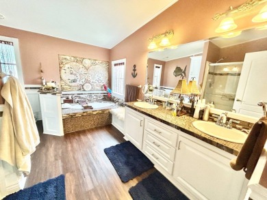 This lovely 3-bedroom, 2-bathroom manufactured home is located on Crane Lakes Golf and Country Club in Florida - for sale on GolfHomes.com, golf home, golf lot