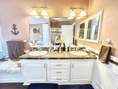 This lovely 3-bedroom, 2-bathroom manufactured home is located on Crane Lakes Golf and Country Club in Florida - for sale on GolfHomes.com, golf home, golf lot