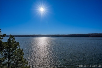 The Bluff House offers a unique blend of modern comfort on The Oaks Golf Course in Missouri - for sale on GolfHomes.com, golf home, golf lot