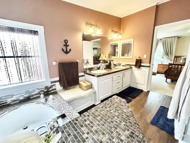This lovely 3-bedroom, 2-bathroom manufactured home is located on Crane Lakes Golf and Country Club in Florida - for sale on GolfHomes.com, golf home, golf lot