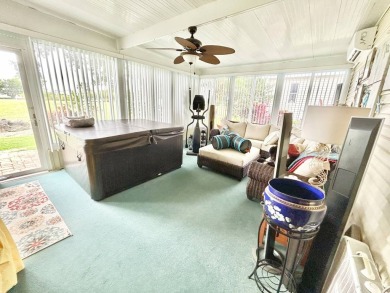 This lovely 3-bedroom, 2-bathroom manufactured home is located on Crane Lakes Golf and Country Club in Florida - for sale on GolfHomes.com, golf home, golf lot