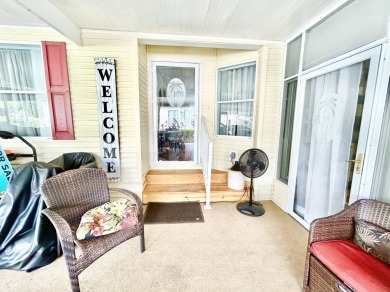 This lovely 3-bedroom, 2-bathroom manufactured home is located on Crane Lakes Golf and Country Club in Florida - for sale on GolfHomes.com, golf home, golf lot