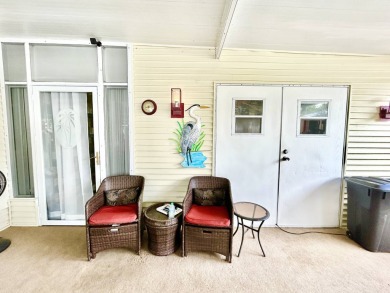 This lovely 3-bedroom, 2-bathroom manufactured home is located on Crane Lakes Golf and Country Club in Florida - for sale on GolfHomes.com, golf home, golf lot