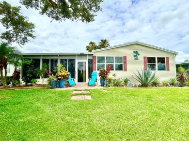 This lovely 3-bedroom, 2-bathroom manufactured home is located on Crane Lakes Golf and Country Club in Florida - for sale on GolfHomes.com, golf home, golf lot