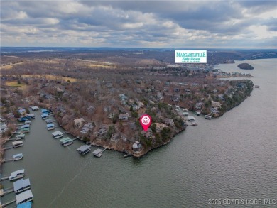 The Bluff House offers a unique blend of modern comfort on The Oaks Golf Course in Missouri - for sale on GolfHomes.com, golf home, golf lot