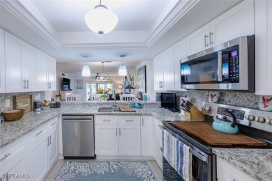 Completely remodeled ground floor end unit 2/2 with den and one on Kelly Greens Golf and Country Club in Florida - for sale on GolfHomes.com, golf home, golf lot