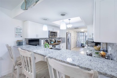 Completely remodeled ground floor end unit 2/2 with den and one on Kelly Greens Golf and Country Club in Florida - for sale on GolfHomes.com, golf home, golf lot