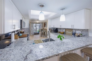 Completely remodeled ground floor end unit 2/2 with den and one on Kelly Greens Golf and Country Club in Florida - for sale on GolfHomes.com, golf home, golf lot