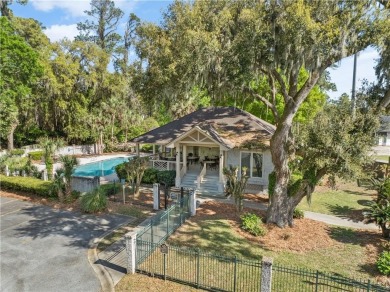 Southern charm meets lowcountry luxury in this beautiful on The King and Prince Golf Course, Home of the Hampton Club in Georgia - for sale on GolfHomes.com, golf home, golf lot