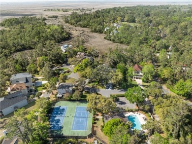 Southern charm meets lowcountry luxury in this beautiful on The King and Prince Golf Course, Home of the Hampton Club in Georgia - for sale on GolfHomes.com, golf home, golf lot