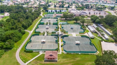 This home has a brand new roof 2025. MOVE IN READY! Embrace on Falcon Watch Golf Club in Florida - for sale on GolfHomes.com, golf home, golf lot