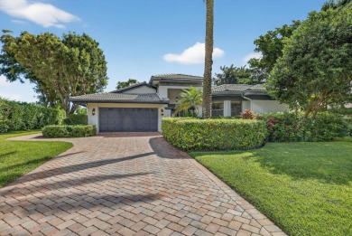 A beautiful Courtyard entrance and amazing 5 acre lake/golf on  in Florida - for sale on GolfHomes.com, golf home, golf lot