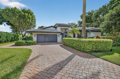 A beautiful Courtyard entrance and amazing 5 acre lake/golf on  in Florida - for sale on GolfHomes.com, golf home, golf lot