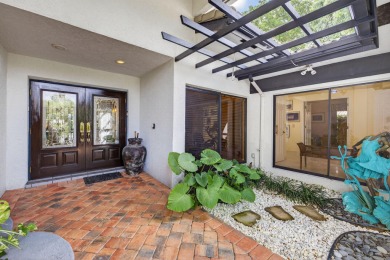 A beautiful Courtyard entrance and amazing 5 acre lake/golf on  in Florida - for sale on GolfHomes.com, golf home, golf lot