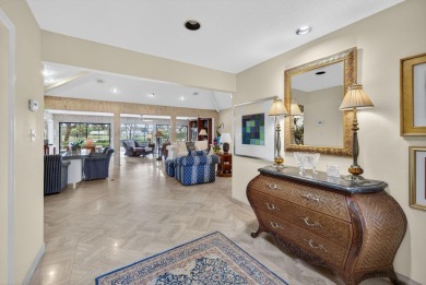 A beautiful Courtyard entrance and amazing 5 acre lake/golf on  in Florida - for sale on GolfHomes.com, golf home, golf lot