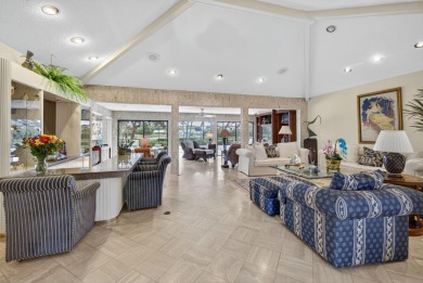 A beautiful Courtyard entrance and amazing 5 acre lake/golf on  in Florida - for sale on GolfHomes.com, golf home, golf lot