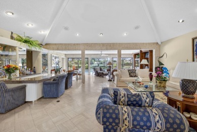 A beautiful Courtyard entrance and amazing 5 acre lake/golf on  in Florida - for sale on GolfHomes.com, golf home, golf lot