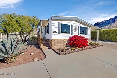 Charming home in great condition with awesome patio and fencing on Tucson Estates Golf Course in Arizona - for sale on GolfHomes.com, golf home, golf lot