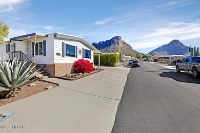 Charming home in great condition with awesome patio and fencing on Tucson Estates Golf Course in Arizona - for sale on GolfHomes.com, golf home, golf lot