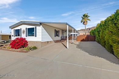 Charming home in great condition with awesome patio and fencing on Tucson Estates Golf Course in Arizona - for sale on GolfHomes.com, golf home, golf lot