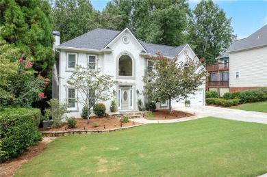 Welcome to your dream home in the highly coveted, resort-style on Towne Lake Hills Golf Club in Georgia - for sale on GolfHomes.com, golf home, golf lot