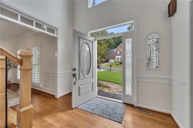 Welcome to your dream home in the highly coveted, resort-style on Towne Lake Hills Golf Club in Georgia - for sale on GolfHomes.com, golf home, golf lot