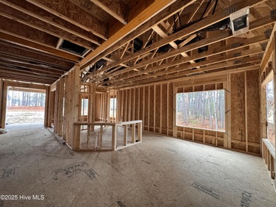 This Granville model boasts spacious great room with an electric on Legacy Golf Links in North Carolina - for sale on GolfHomes.com, golf home, golf lot