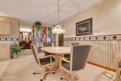 Set on 1.46 acres in Tanglwood Lakes, this 3,310-SF PRIVATE on Paupack Hills Golf and Country Club in Pennsylvania - for sale on GolfHomes.com, golf home, golf lot