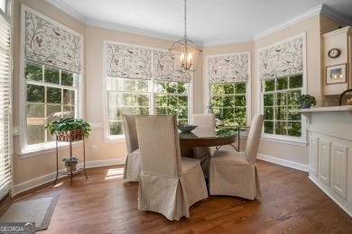 Tucked into a quiet cul-de-sac in sought-after Windward, this on The Golf Club of Georgia in Georgia - for sale on GolfHomes.com, golf home, golf lot