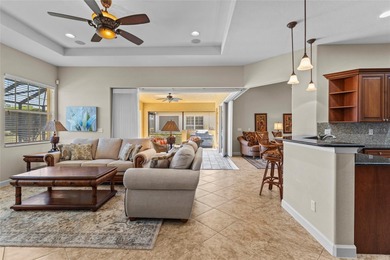 Perfectly positioned along the golf course, this elegant pool on Venetian Golf and River Club in Florida - for sale on GolfHomes.com, golf home, golf lot