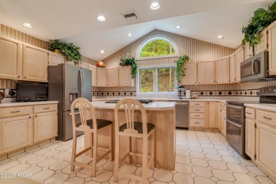 Set on 1.46 acres in Tanglwood Lakes, this 3,310-SF PRIVATE on Paupack Hills Golf and Country Club in Pennsylvania - for sale on GolfHomes.com, golf home, golf lot