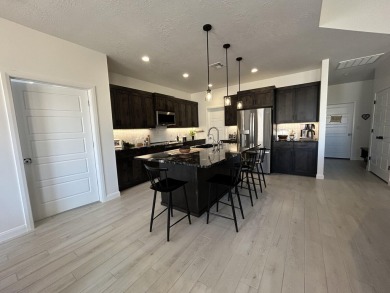 1325 Pocket Mesa Dr - Modern Desert Living at The Ledges. This on The Ledges Golf Club in Utah - for sale on GolfHomes.com, golf home, golf lot