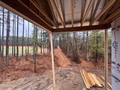 This Granville model boasts spacious great room with an electric on Legacy Golf Links in North Carolina - for sale on GolfHomes.com, golf home, golf lot