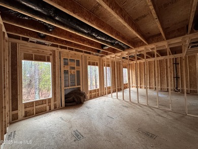 This Granville model boasts spacious great room with an electric on Legacy Golf Links in North Carolina - for sale on GolfHomes.com, golf home, golf lot