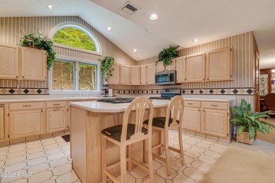Set on 1.46 acres in Tanglwood Lakes, this 3,310-SF PRIVATE on Paupack Hills Golf and Country Club in Pennsylvania - for sale on GolfHomes.com, golf home, golf lot
