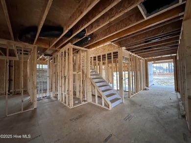 This Granville model boasts spacious great room with an electric on Legacy Golf Links in North Carolina - for sale on GolfHomes.com, golf home, golf lot