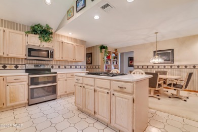 Set on 1.46 acres in Tanglwood Lakes, this 3,310-SF PRIVATE on Paupack Hills Golf and Country Club in Pennsylvania - for sale on GolfHomes.com, golf home, golf lot