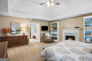 Tucked into a quiet cul-de-sac in sought-after Windward, this on The Golf Club of Georgia in Georgia - for sale on GolfHomes.com, golf home, golf lot