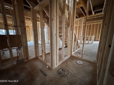 This Granville model boasts spacious great room with an electric on Legacy Golf Links in North Carolina - for sale on GolfHomes.com, golf home, golf lot