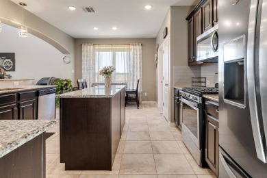 This gorgeous four-bedroom, 2.5-bath, two-story home is in a on The Golf Club At Champions Circle in Texas - for sale on GolfHomes.com, golf home, golf lot